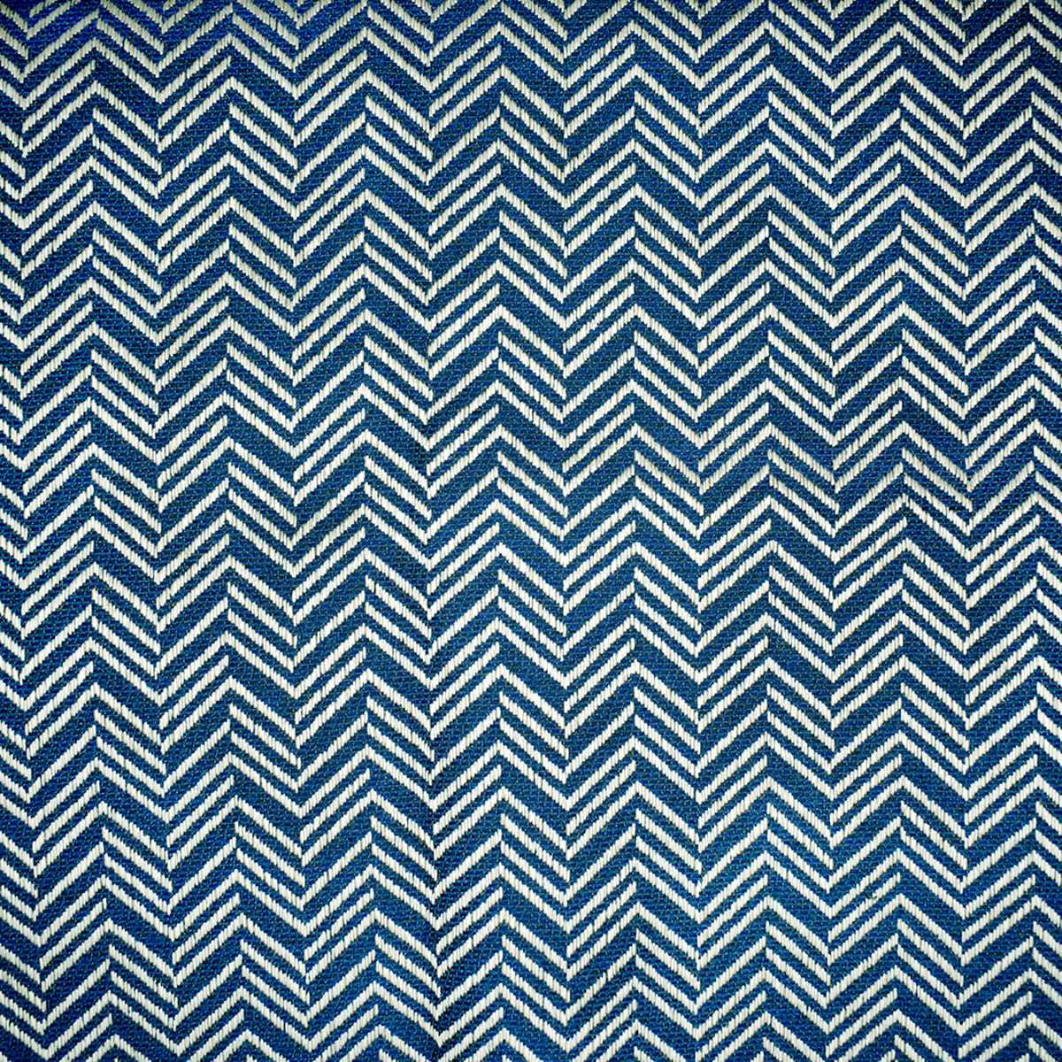 F4127 Indigo upholstery material that enhances room aesthetics.